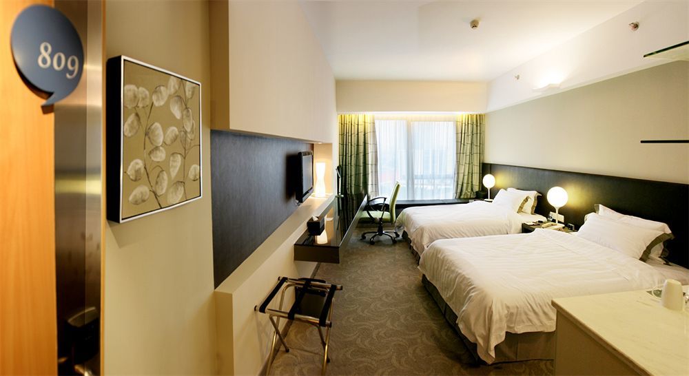Yi-Wu Commatel Hotel 広州 エクステリア 写真